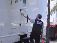 Licensed security guard providing access control and site protection at Toronto film production location