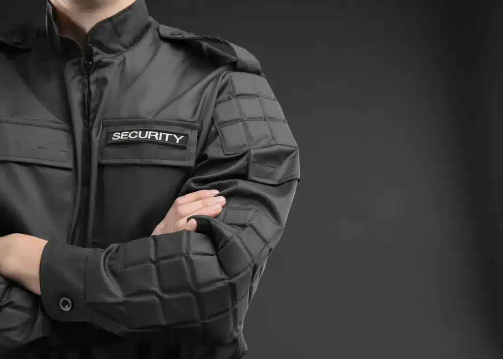 Security guard on active duty at Toronto television production set protecting crew and equipment